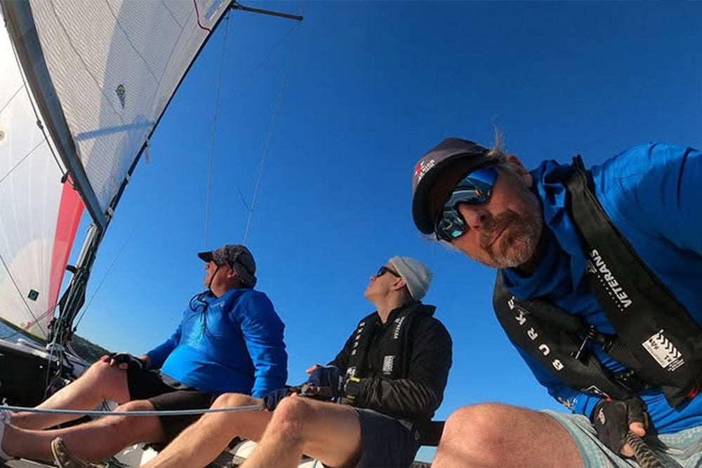 Saltwater veterans sailing in Burke Standard Inflatable PFD - Level 150 - Black - Saltwater Veterans x Burke Marine